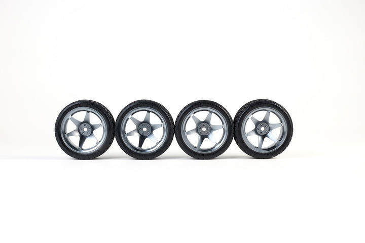 Set of 4 on-road Tyres - Yokohama tread - Medium rubber - 6-spoke Borbet design - 26/66mm - pre-glued - 1/10