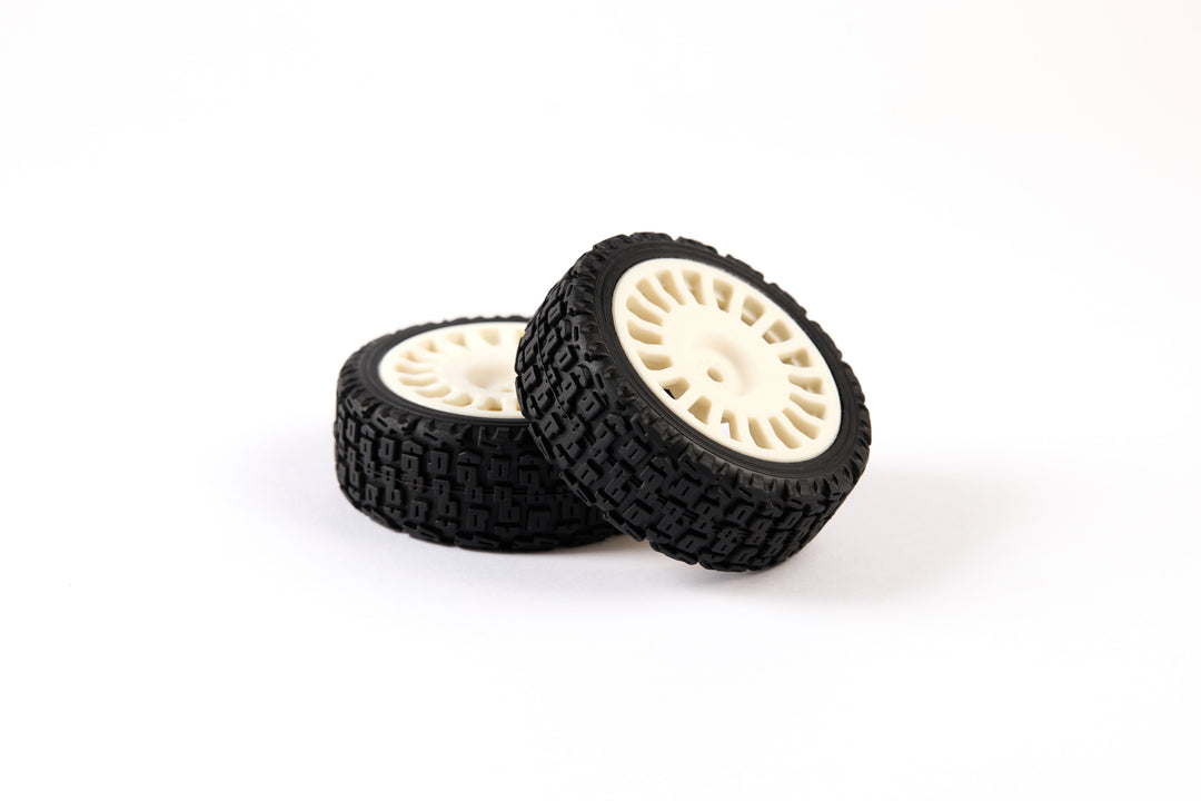 Set of 2 rally tyres - Block type tread - Rubber - 18-spoke Monoblock Design - 25/66mm - pre-glued - 1/10
